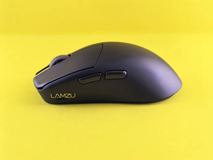 Wired and wireless gaming mice side by side on a mousepad