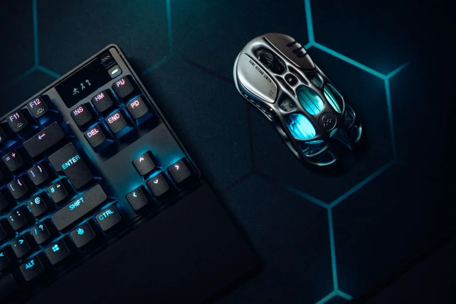 A gamer adjusting their mousepad before a session