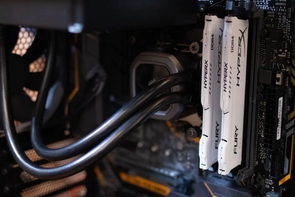 aio liquid cooler mounted above a gaming motherboard