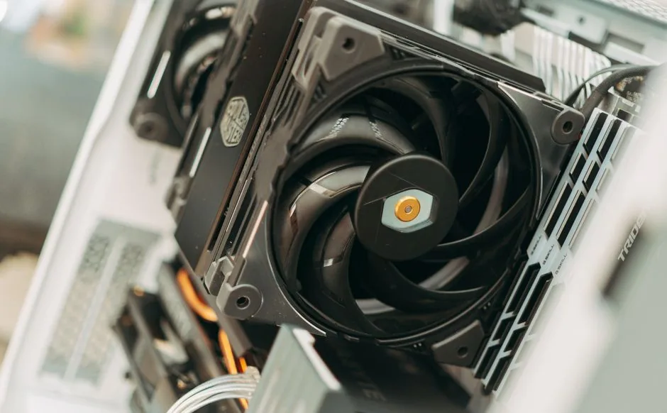 interior of a white mesh-front PC case with several ARGB intake fans