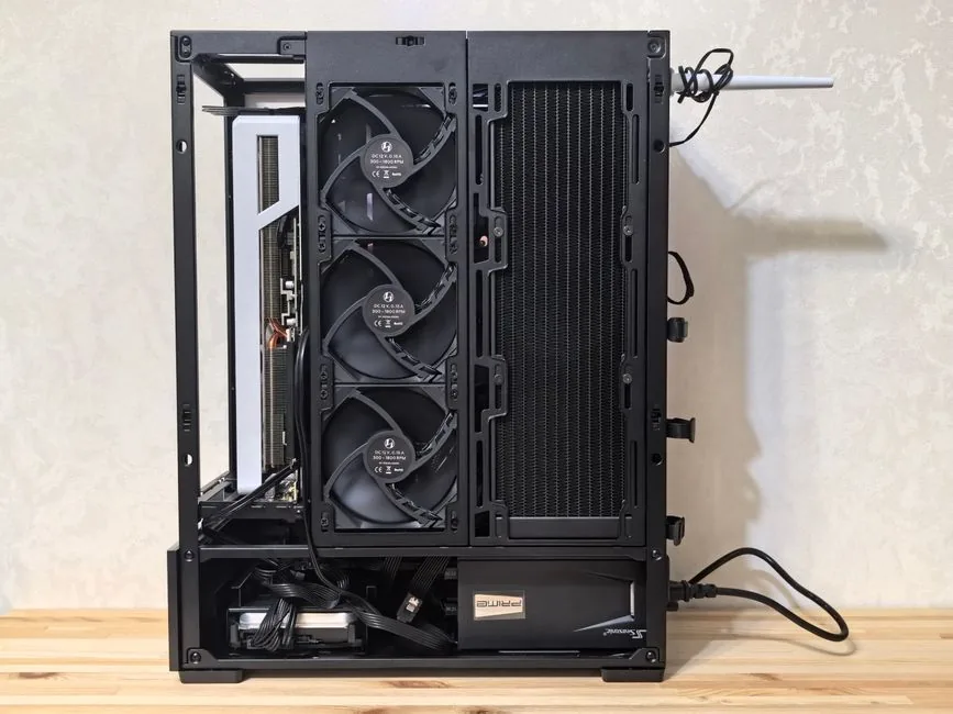 the clean interior of a gaming pc case with tidy cable routing