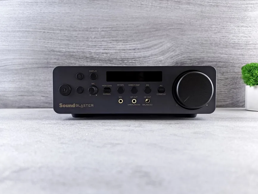 audiophile-grade desktop dac amp connected to headphones