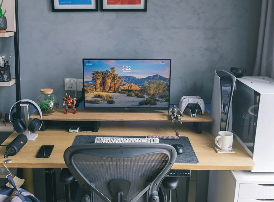An adjustable desk and chair shown from the side with proper height alignment markers