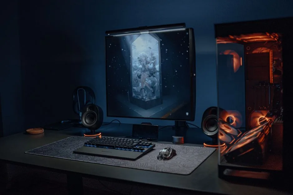 A budget gaming desk setup with dual monitors and clean cable management