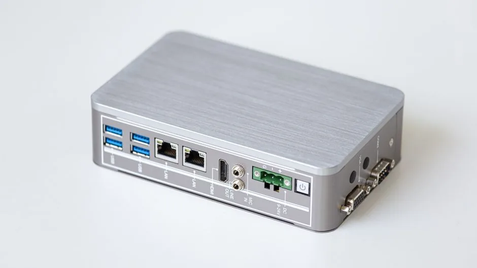 are small form factor computers good for streaming and travel — slim console-style desktop in a media cabinet