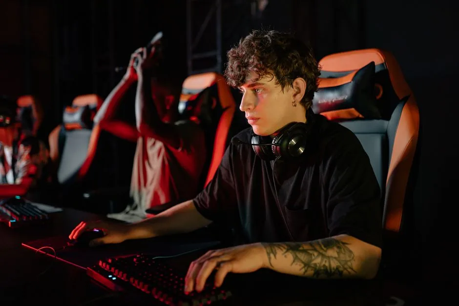 glowing mechanical keyboard and mouse on a dark esports setup